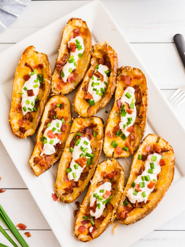 loaded potato skins on a platter