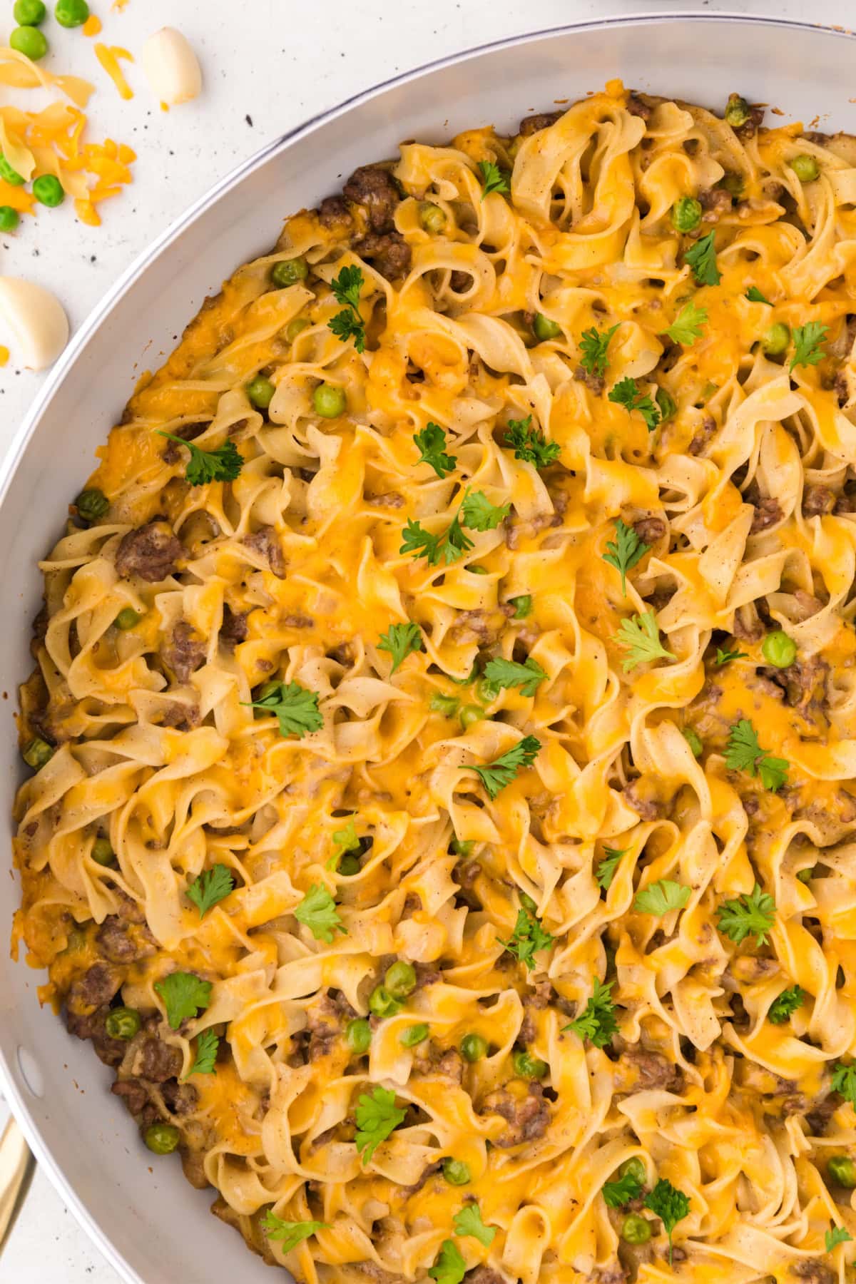 This Ground Beef Stroganoff is creamy, cheesy, and loaded with beef and noodles in a rich sauce. A cozy, easy dinner idea! ground beef stroganoff in skillet