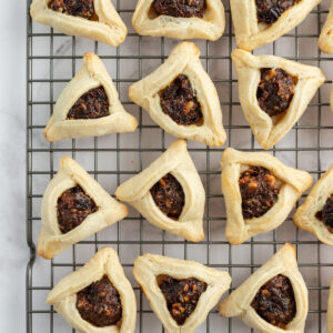 hamantaschen on a wire cooling rack