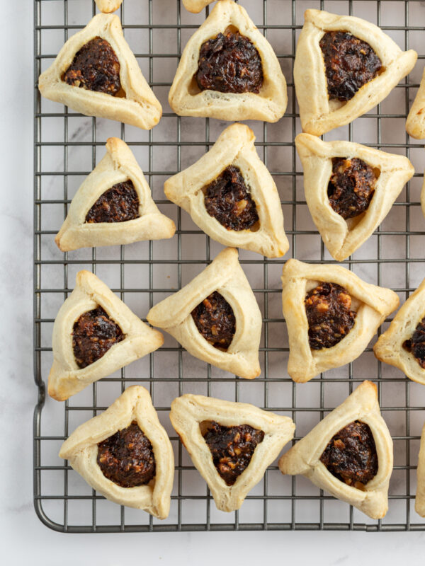 hamantaschen on a wire cooling rack