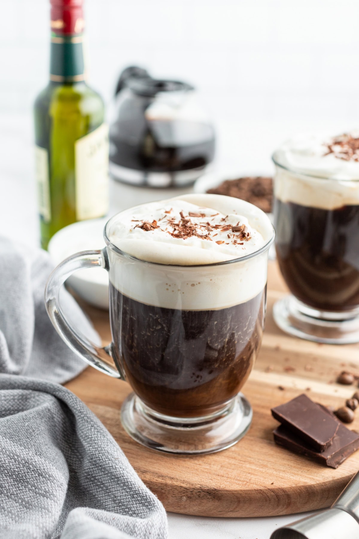 Learn how to make Irish Coffee—hot coffee, Irish whiskey, brown sugar, and whipped cream. A cozy classic cocktail. how to make irish coffee in mug