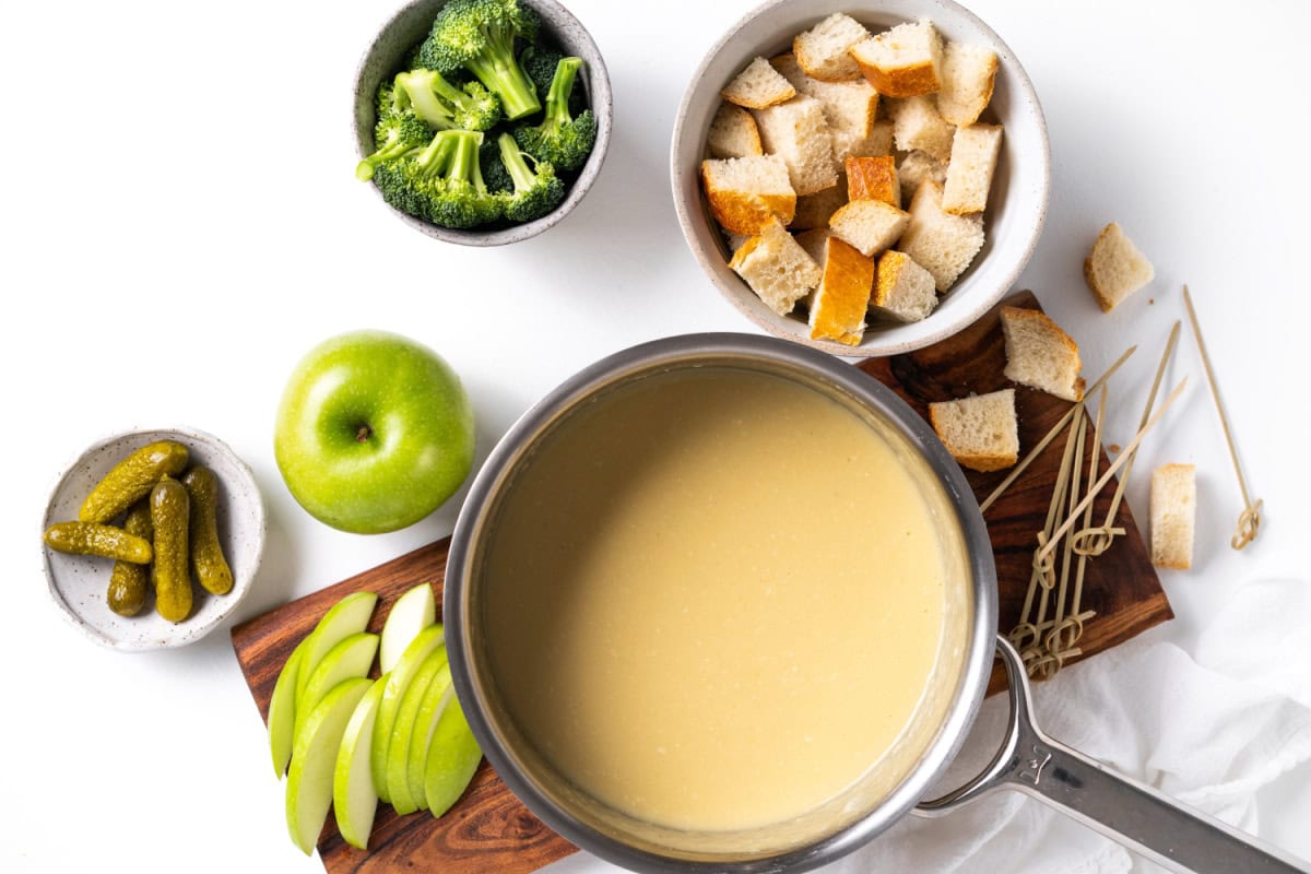 pot of cheese fondue with dippers
