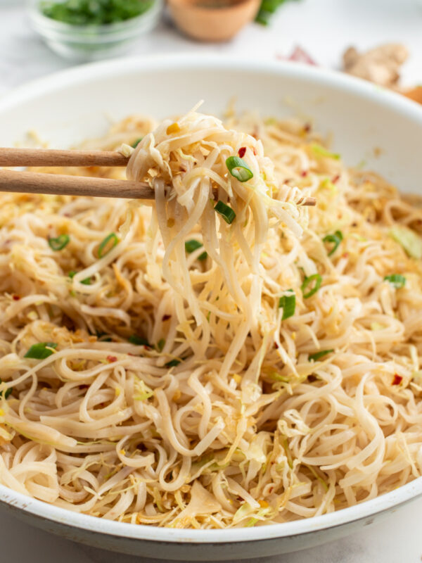 chopsticks holding up some longevity noodles