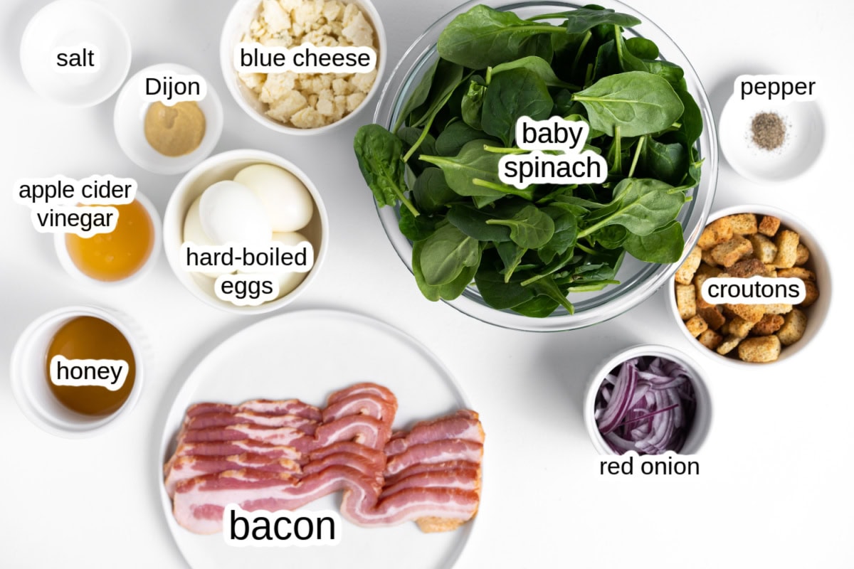 ingredients displayed for making baby spinach salad