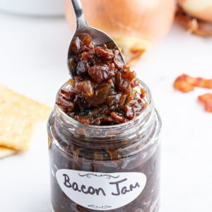 spooning bacon onion jam out of jar