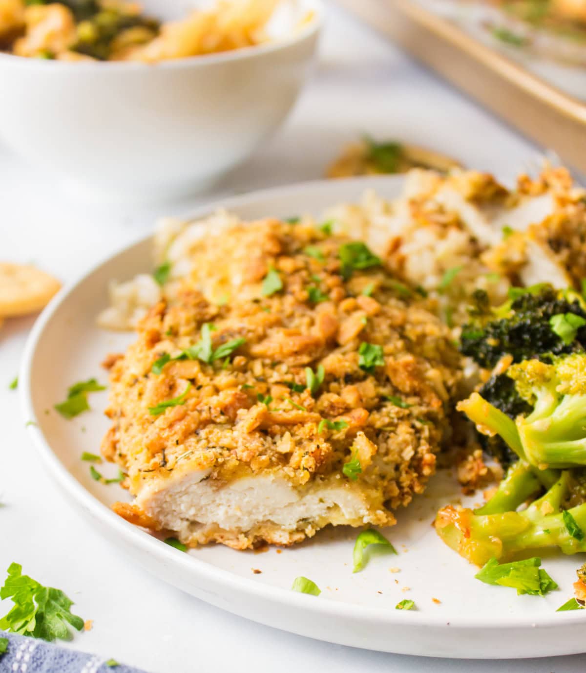 butter cracker chicken on plate with slice taken out of it