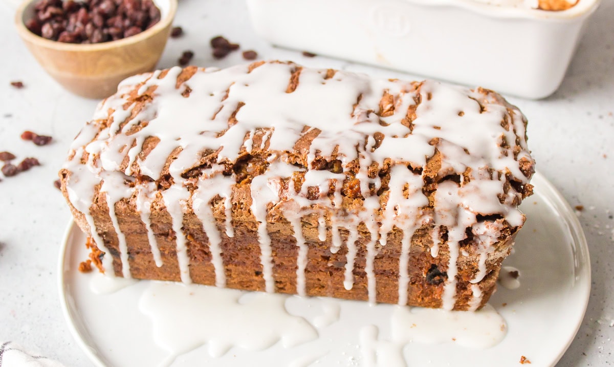 loaf of cinnamon bread with raisins covered with glaze