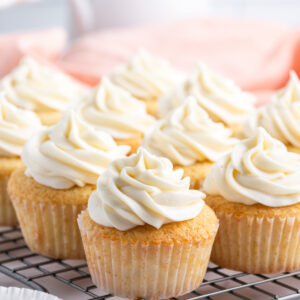 homemade vanilla cupcakes on a rack