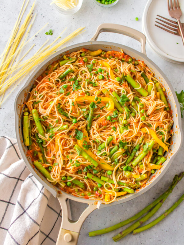 skillet of light spring pasta with veggies