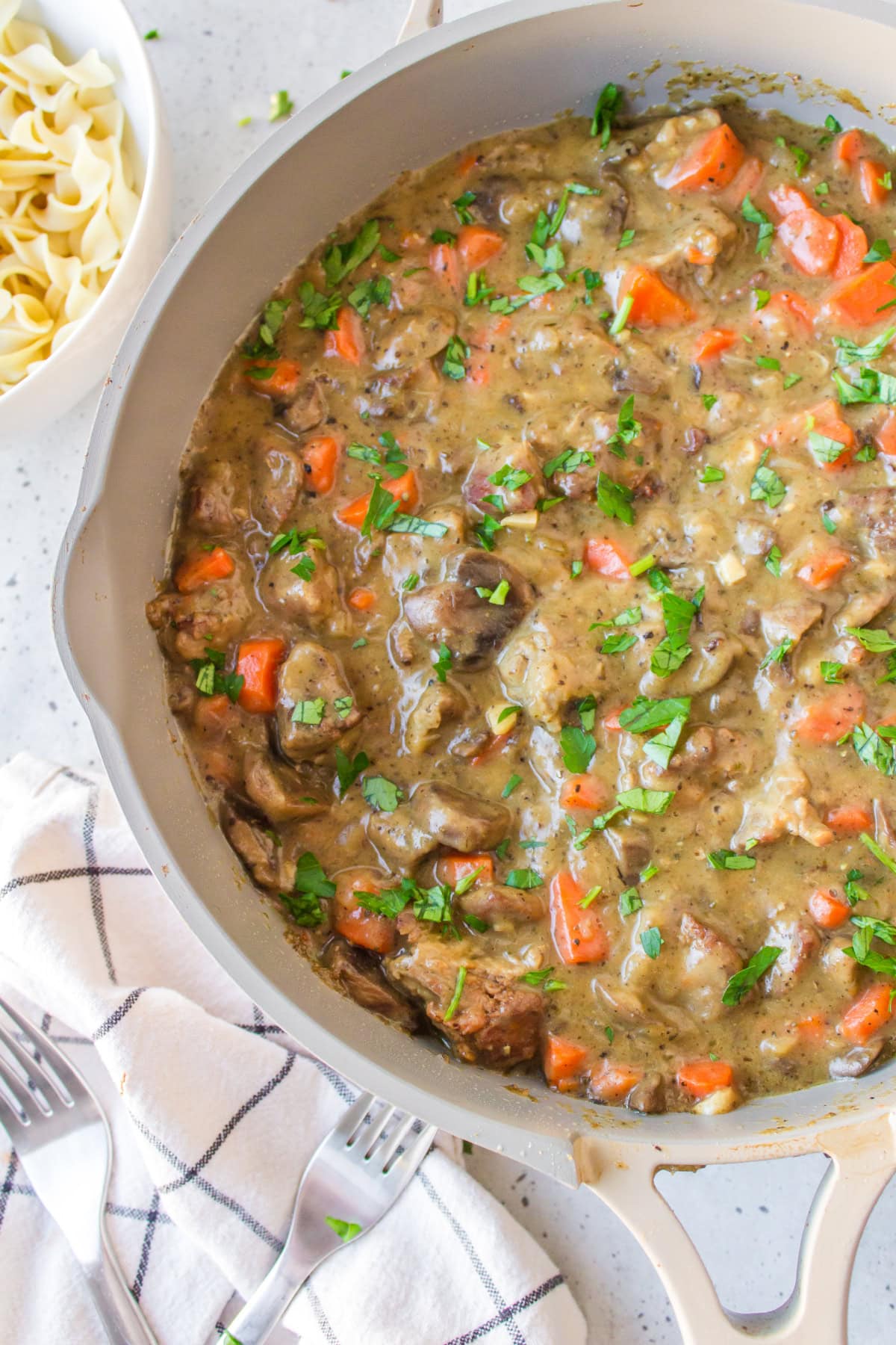 pork meat stew in a skillet