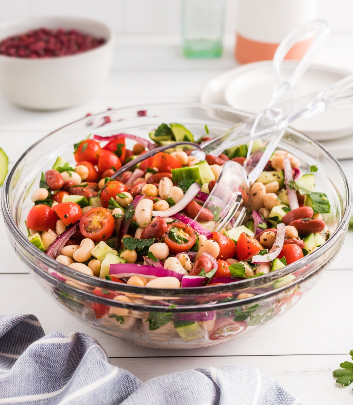 bowl of 3 bean salad with tongs