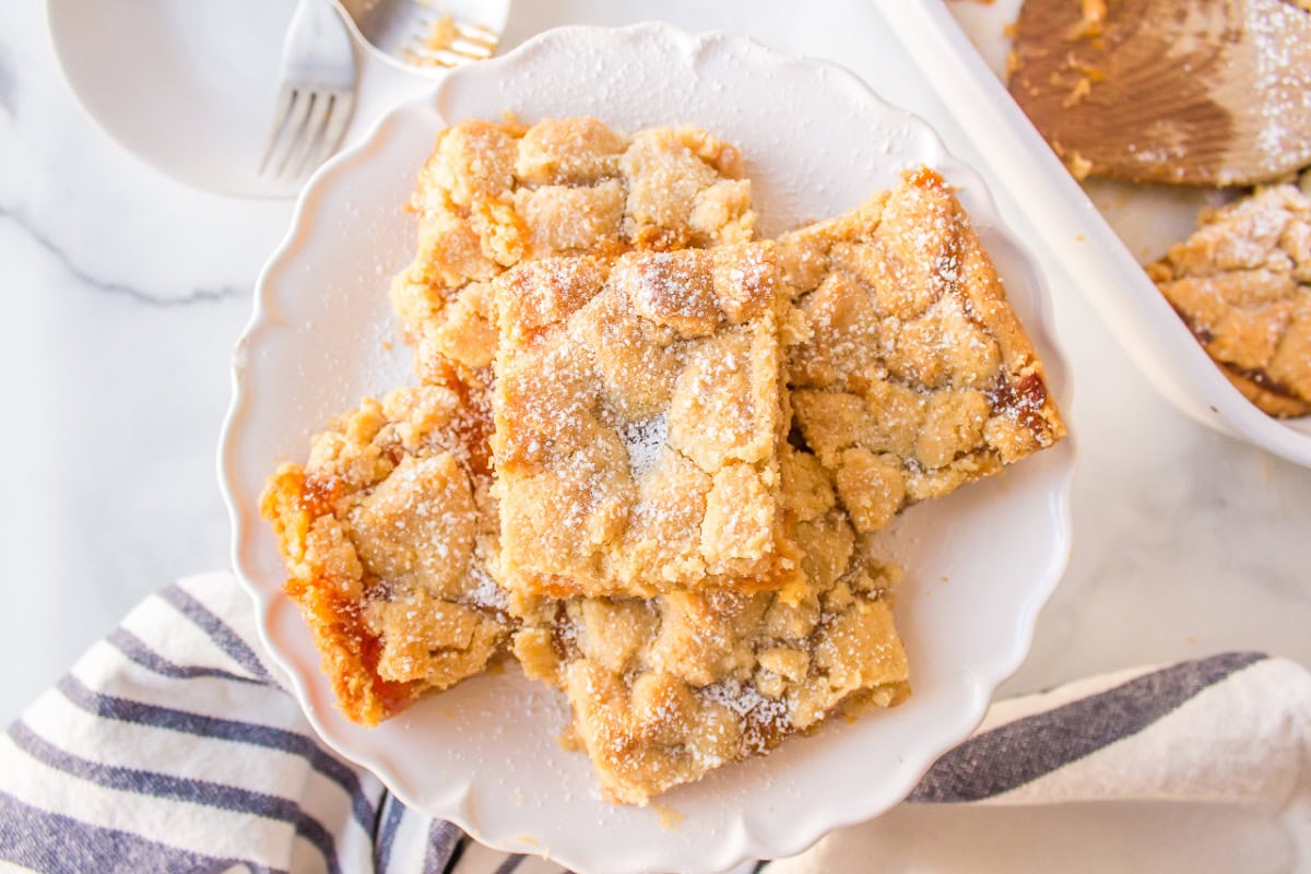 overhead shot of apricot shortbread bars on plate