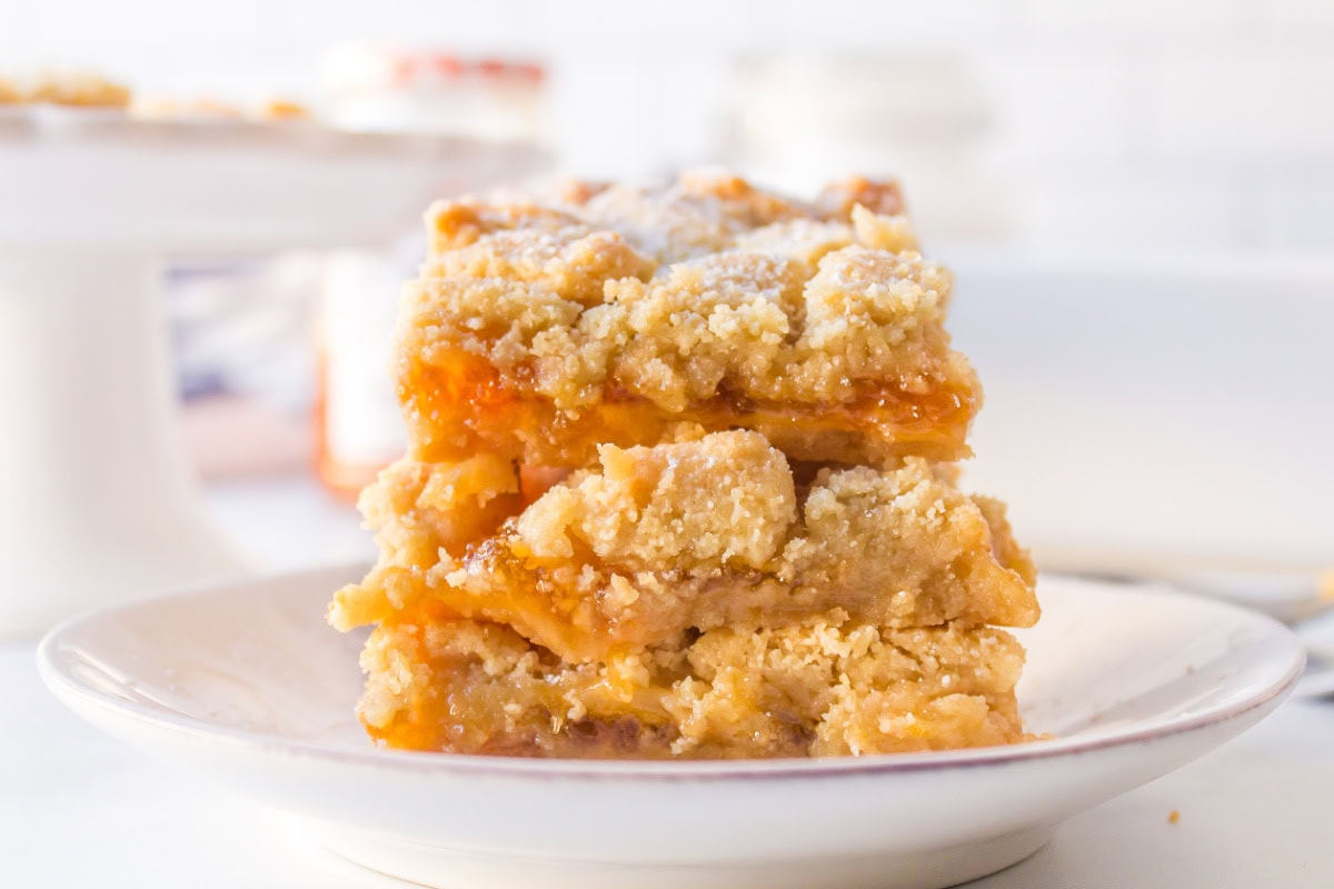 apricot shortbread bars stacked 3 high