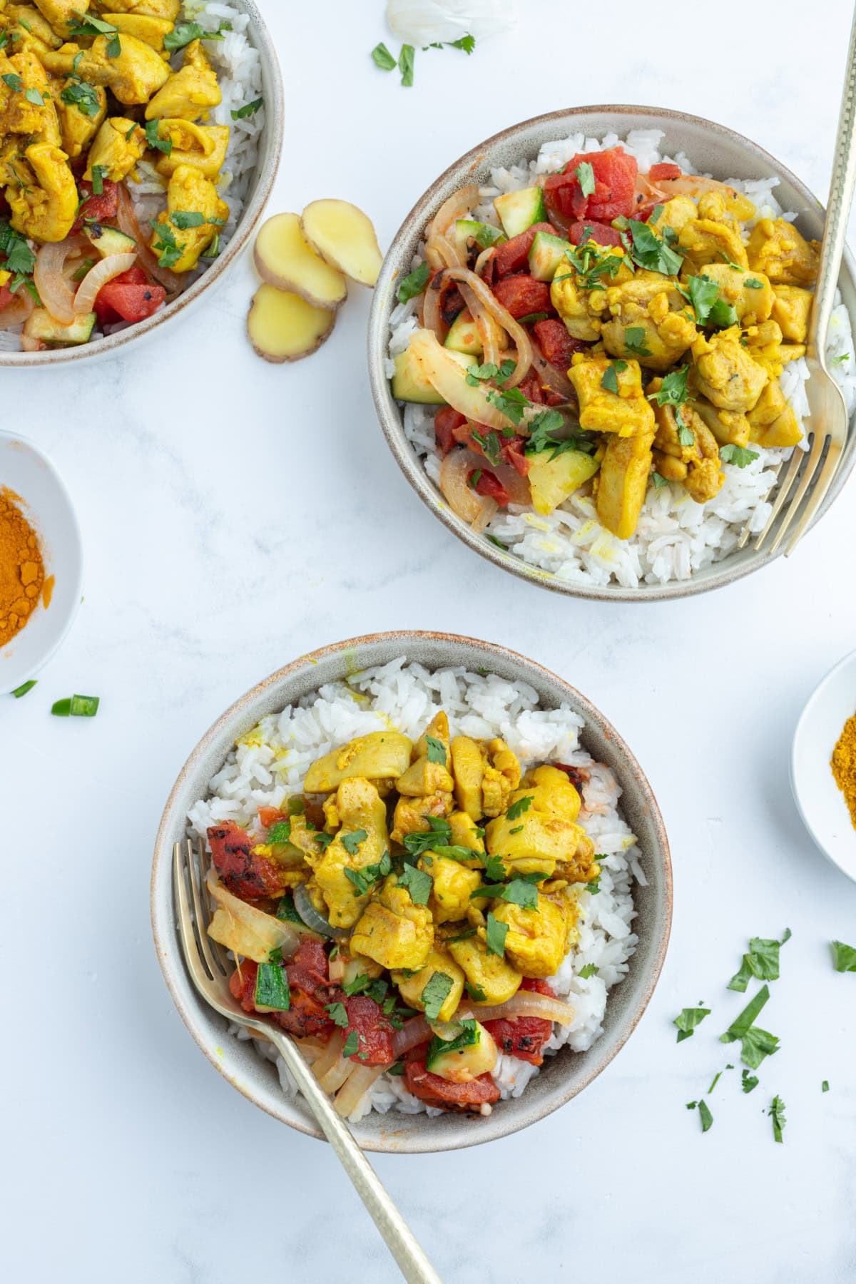 three chicken curry bowls