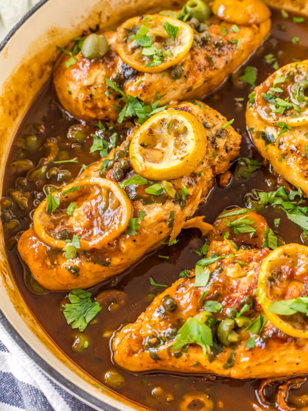 chicken with roasted lemons in skillet