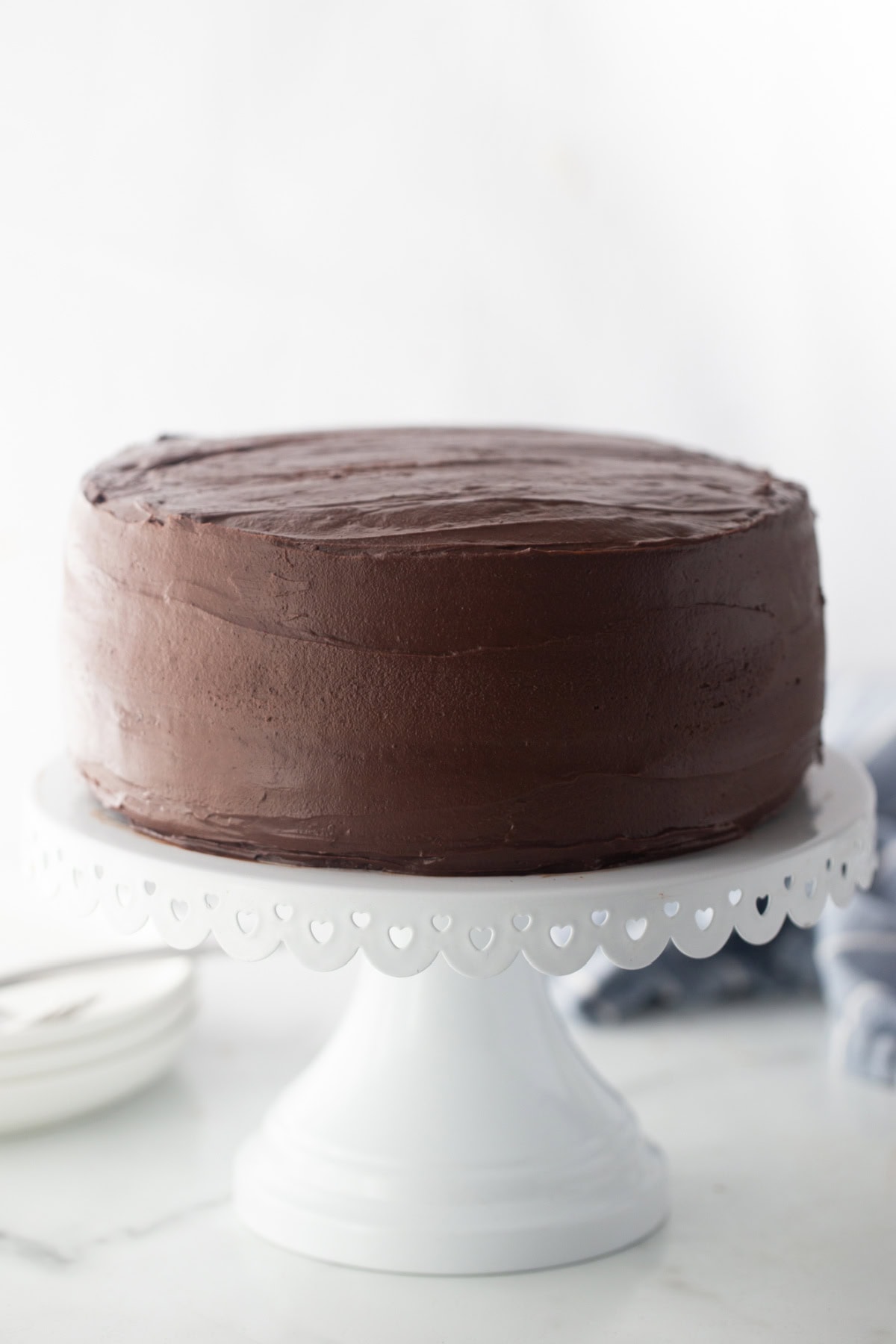 chocolate mayonnaise cake on a cake stand