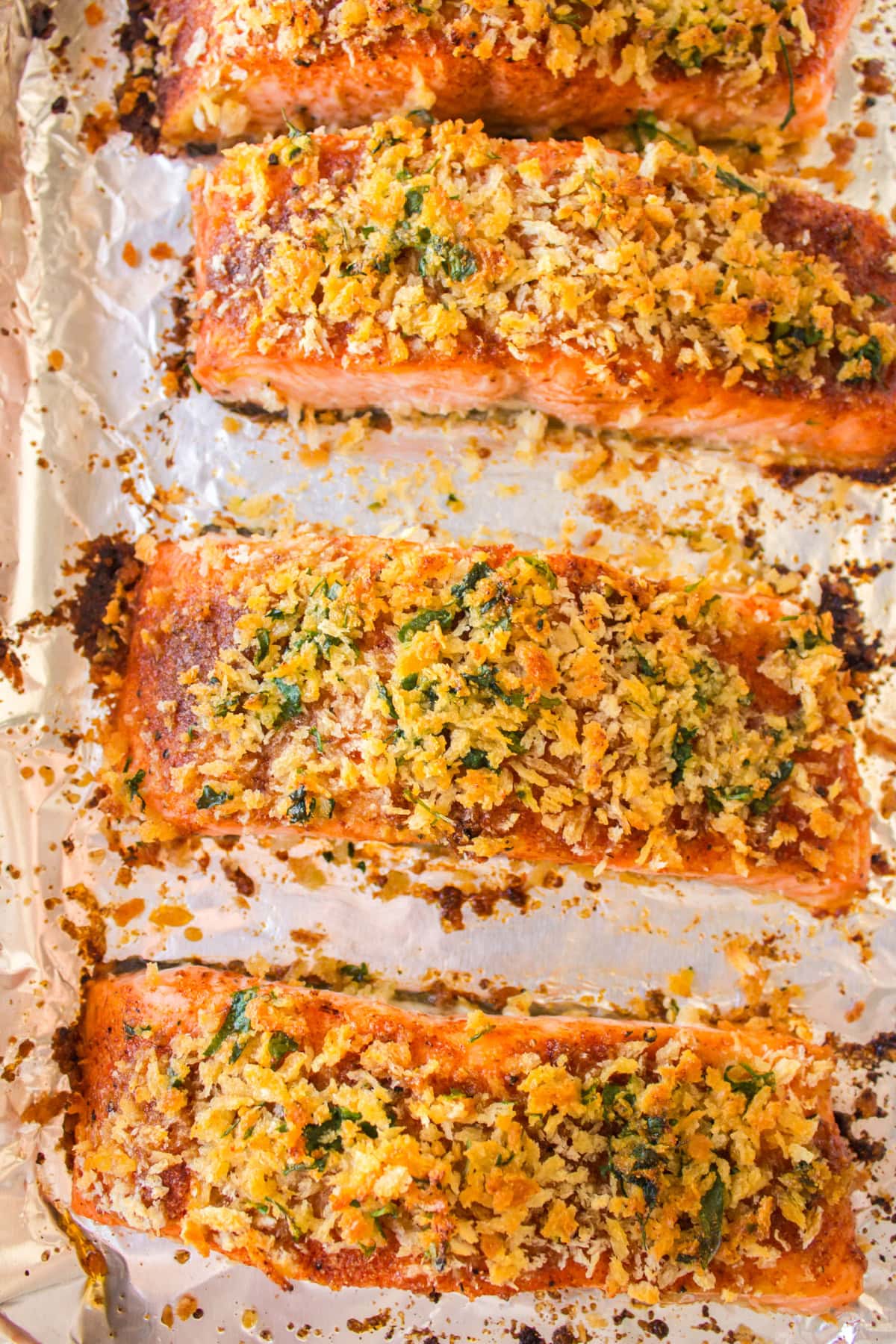 Easy Baked Salmon with a crispy breadcrumb topping and sweet savory flavor. A quick and delicious salmon dinner ready in minutes. overhead shot of baked salmon