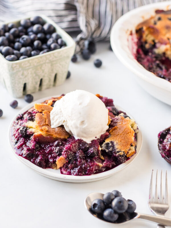 serving of easy blueberry cobbler with vanilla ice cream