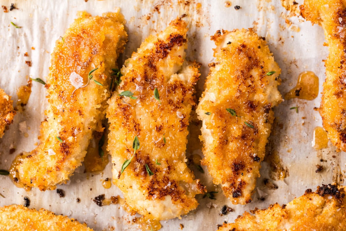 hot honey chicken tenders on baking sheet