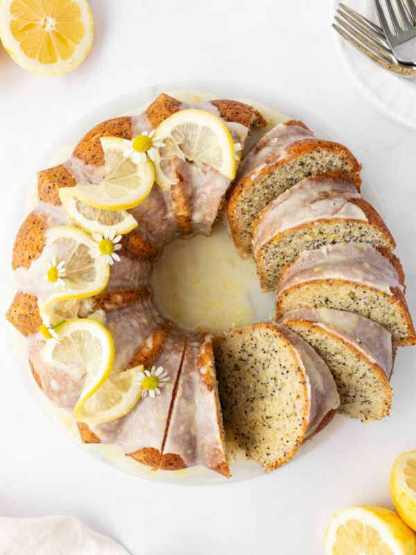 lemon poppy seed cake half sliced