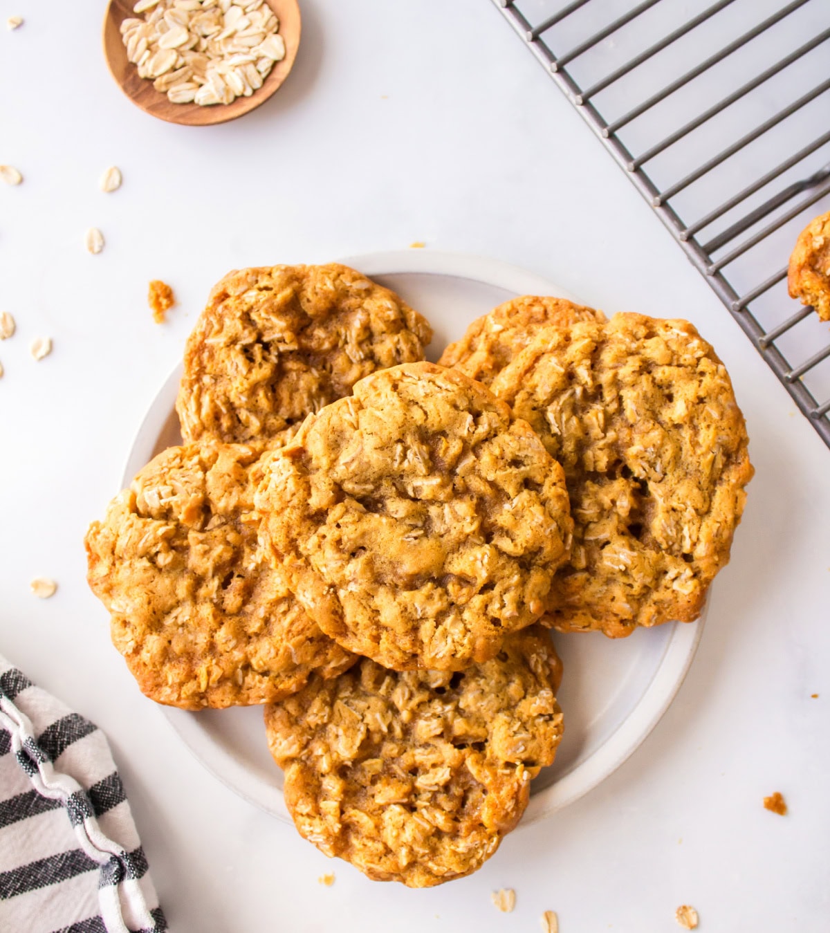 Oatmeal Refrigerator Cookies are easy slice-and-bake cookies with a soft chewy texture. Make the dough ahead and bake fresh anytime! oatmeal refrigerator cookies on a plate