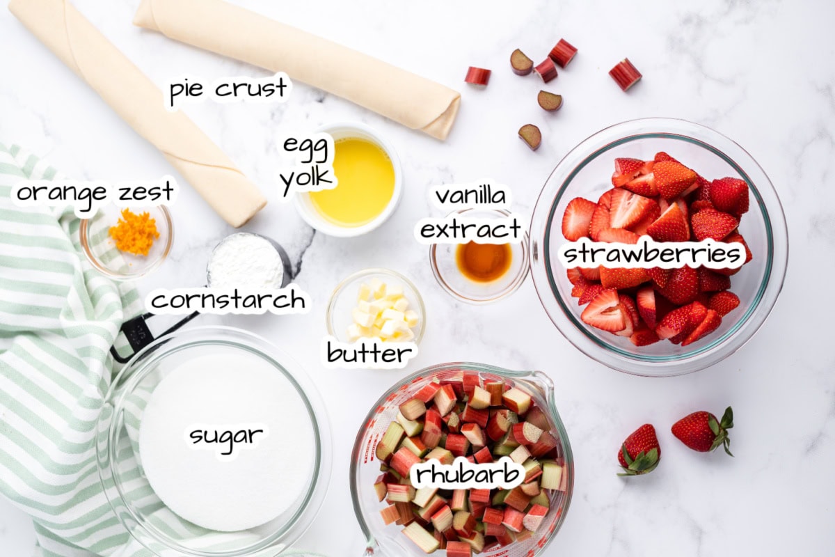 ingredients displayed for making strawberry rhubarb pie