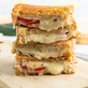 stack of tomato grilled cheese halves