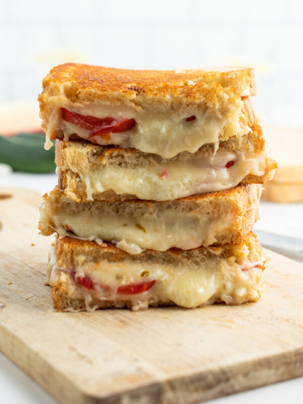 stack of tomato grilled cheese halves