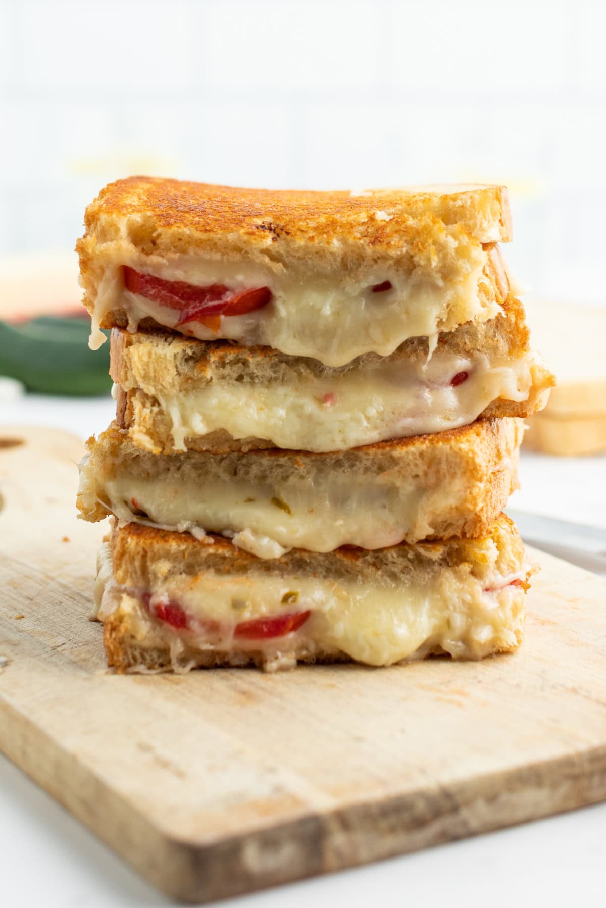 stack of tomato grilled cheese halves