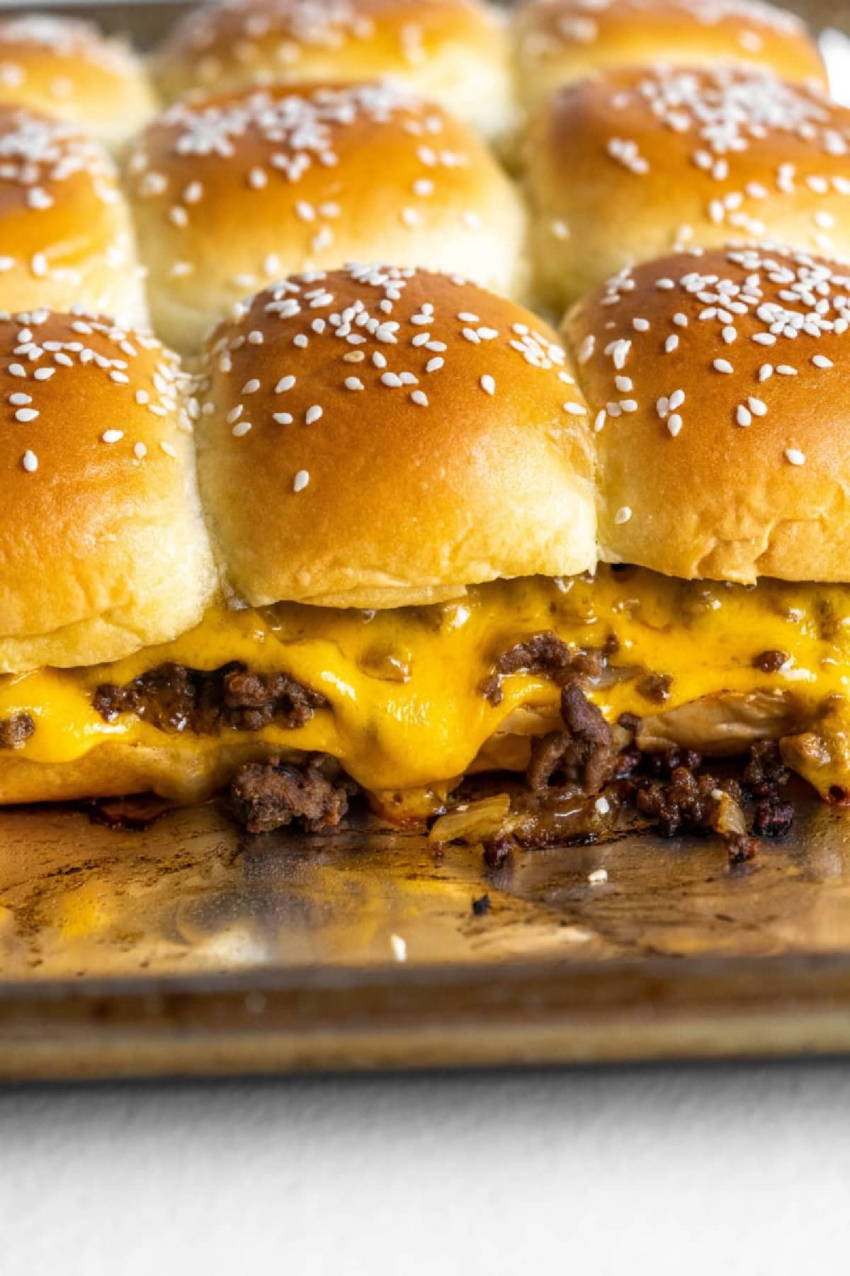 cheeseburger sliders on a pan