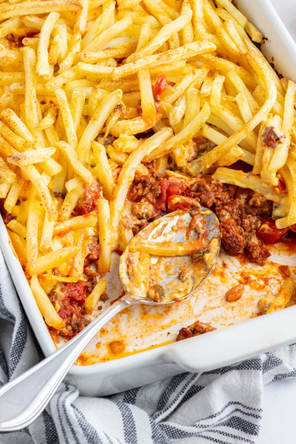 cheeseburger and fries casserole in a dish