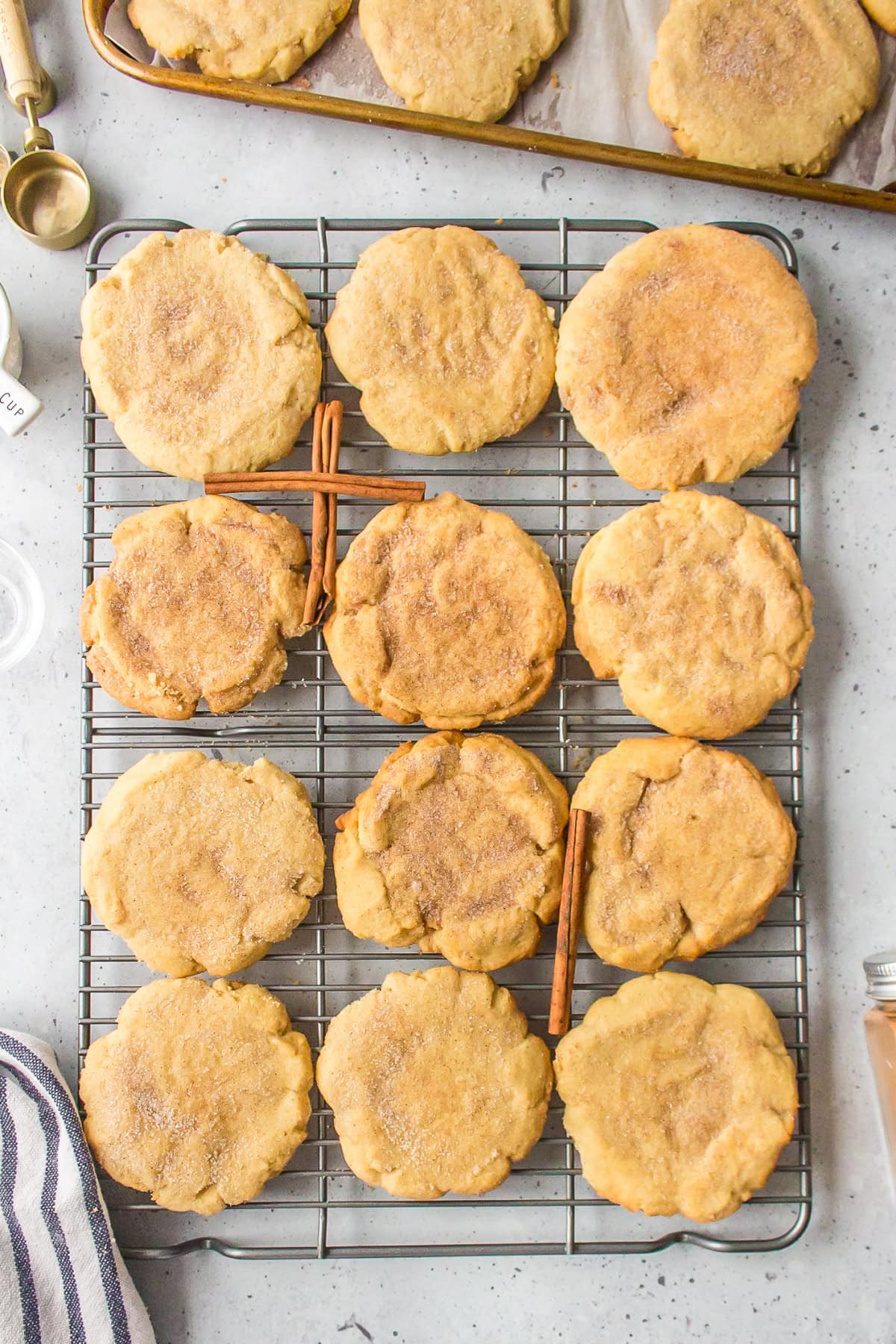 sugar and cinnamon cookies on a cooling rack