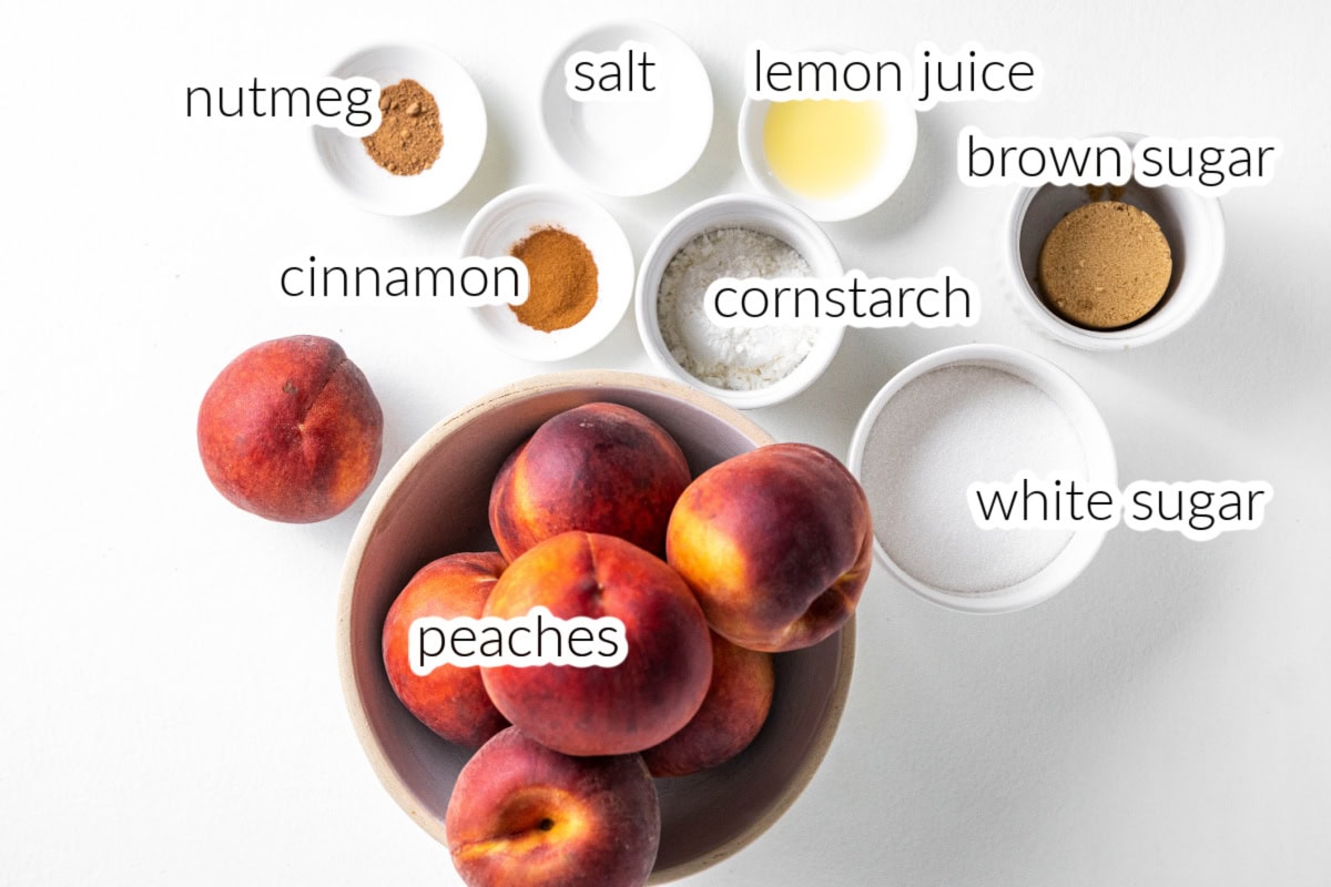 This Fresh Peach Pie Recipe is everything summer baking should be! 🍑 Made with juicy ripe peaches, a flaky homemade butter crust and a gorgeous lattice top, this classic pie is perfect for holidays, BBQs and family gatherings. Save this recipe for peach season! #peachpie #freshpeaches #summerdesserts #pierecipe #homemadepie ingredients displayed for making fresh peach pie