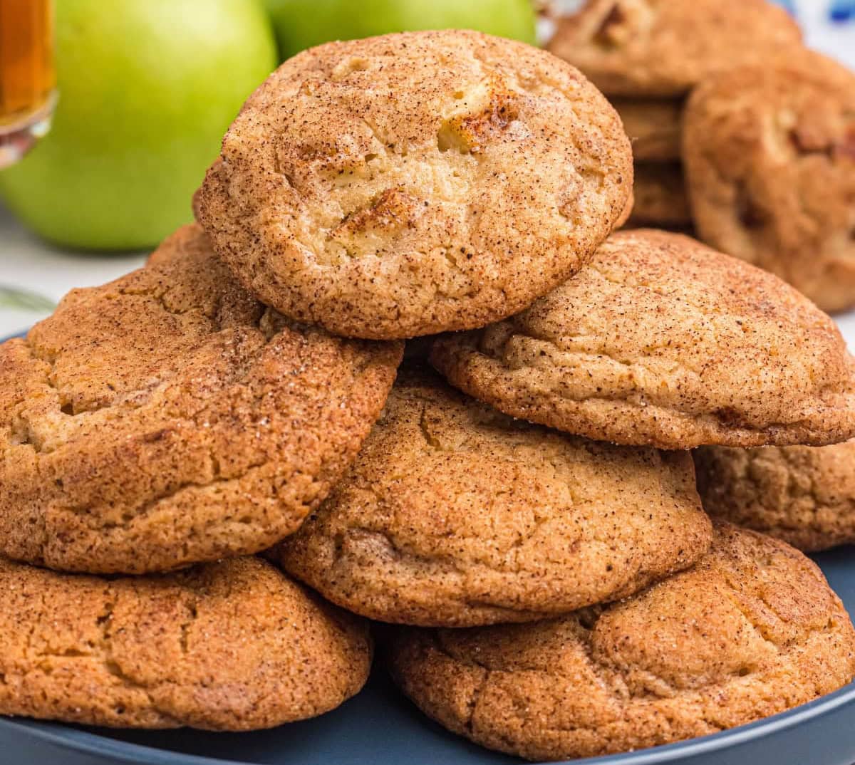 The 50 best apple recipes for fall! 🍎 Find delicious ways to use fresh apples with easy apple breads, muffins, cakes, pies, crisps, cobblers, breakfast recipes and desserts. Perfect for apple picking season, fall baking, Thanksgiving and anytime you have a big bag of apples to use. Save this collection of easy apple recipes for fall! pile of apple snickerdoodles