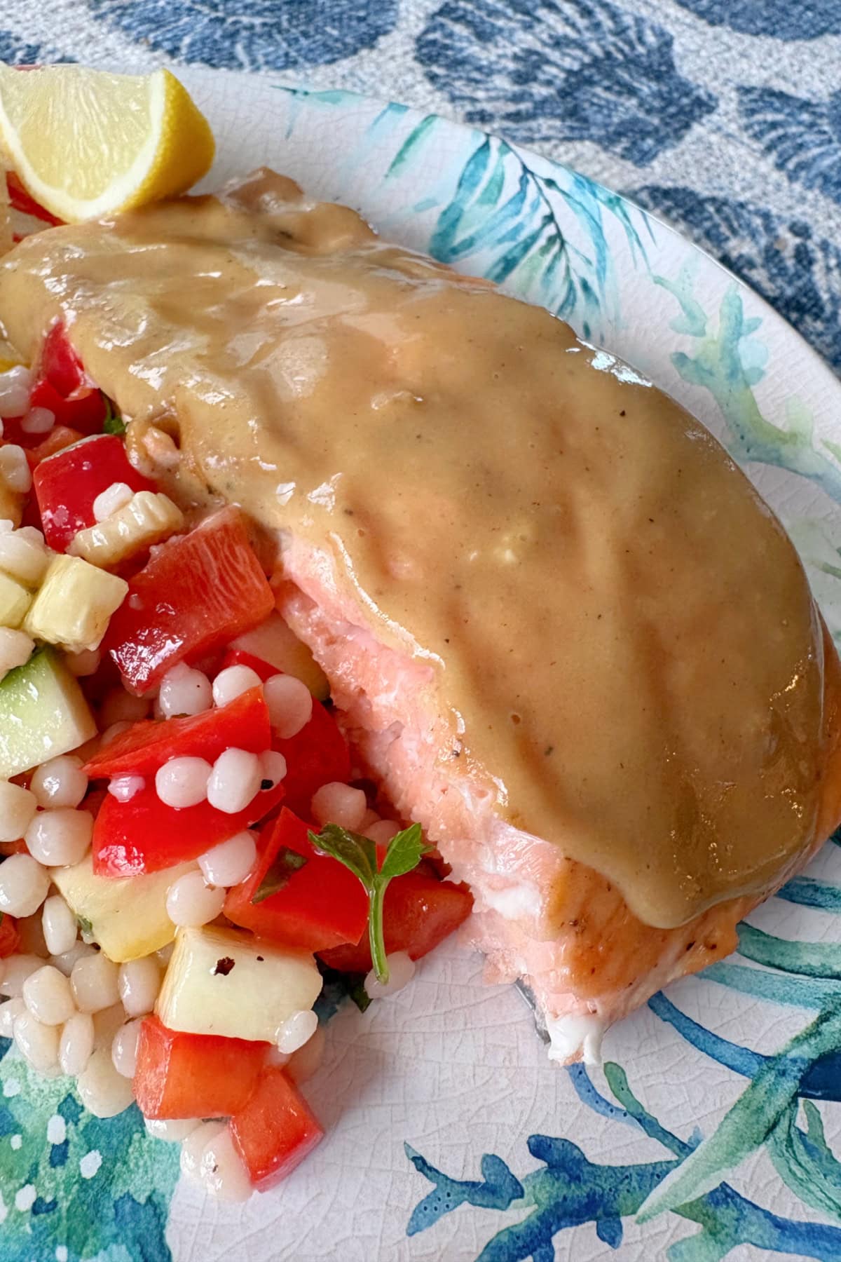 This Maple Mustard Salmon is one of the easiest salmon dinners you'll ever make! 🍁 Made with Dijon mustard, pure maple syrup and garlic, it's sweet, savory, flaky and perfect for busy weeknights or entertaining. Save this easy baked salmon recipe! #salmon #salmonrecipe #healthydinner #weeknightdinner #seafood salmon on plate served with salad
