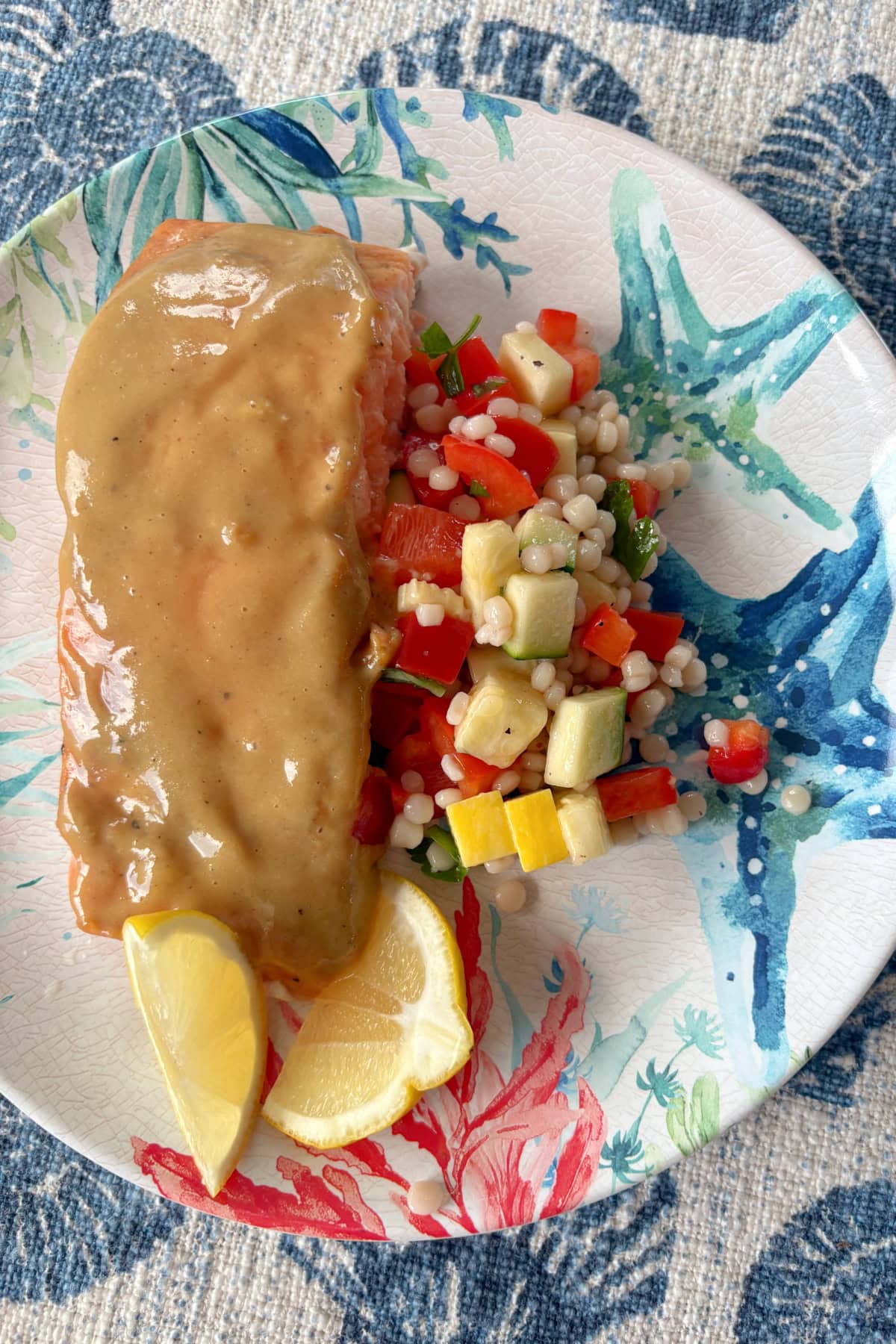 This Maple Mustard Salmon is one of the easiest salmon dinners you'll ever make! 🍁 Made with Dijon mustard, pure maple syrup and garlic, it's sweet, savory, flaky and perfect for busy weeknights or entertaining. Save this easy baked salmon recipe! #salmon #salmonrecipe #healthydinner #weeknightdinner #seafood maple mustard salmon serving on plate with salad