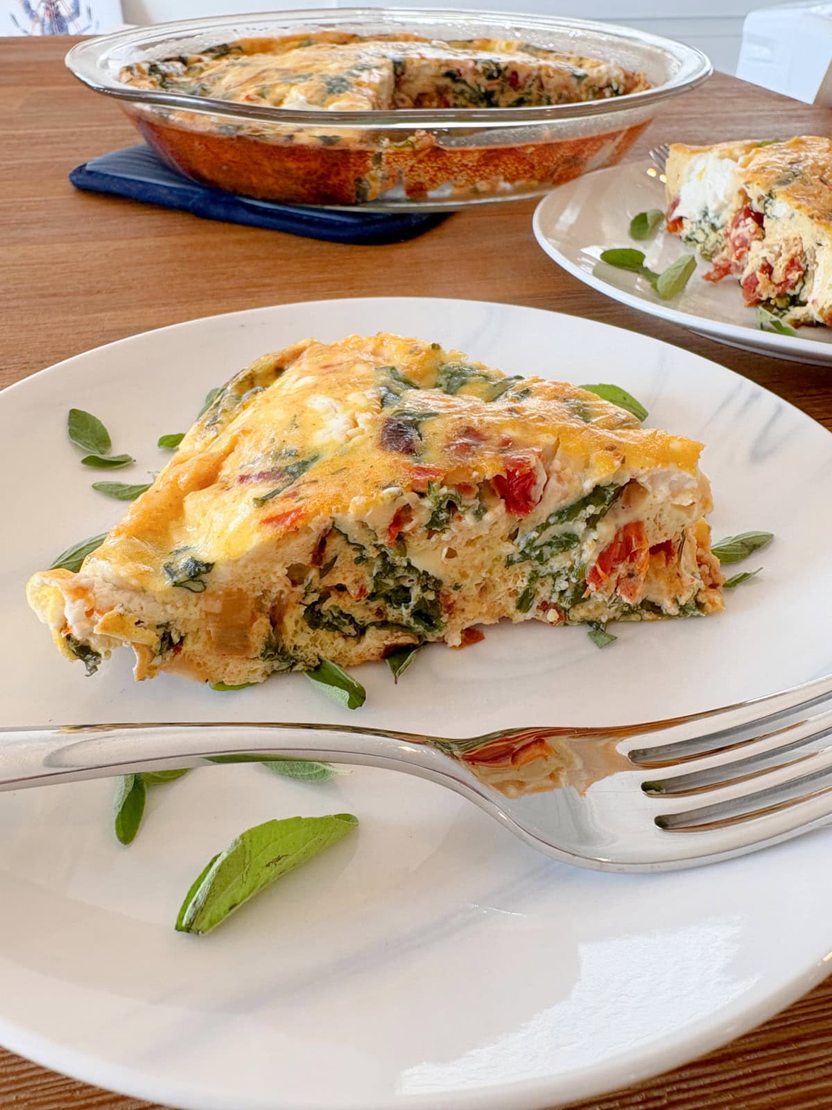 slice of marry me quiche on a plate