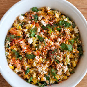 mexican street corn salad in white bowl