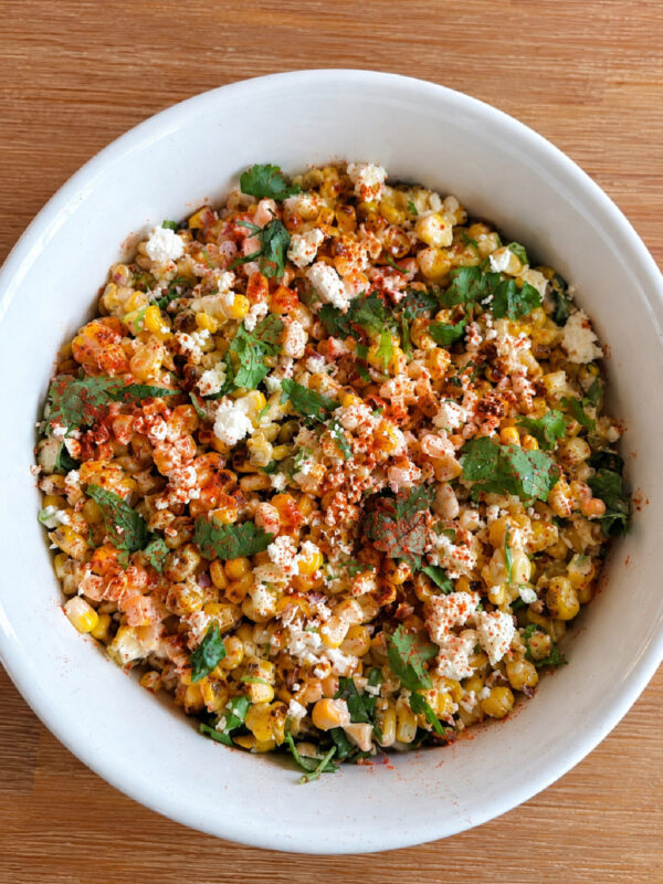 mexican street corn salad in white bowl