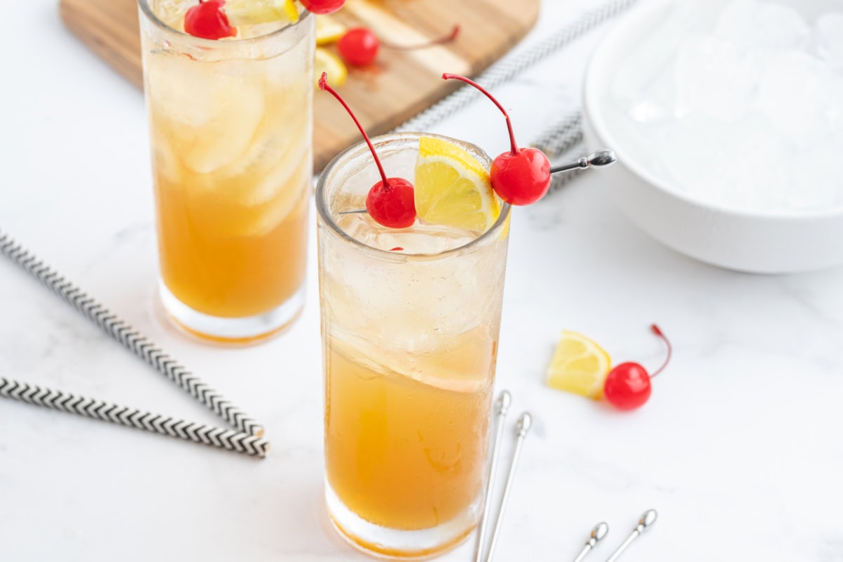 two glasses of whiskey sour punch